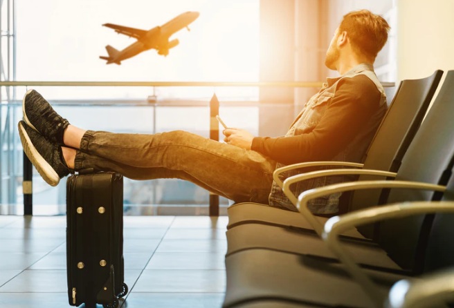 Broken Heart Man seating in airport