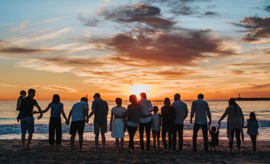 Family photo at beach sunset view