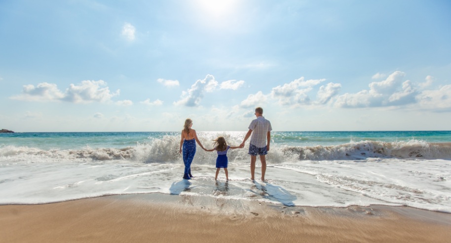 Family vacation photo at beach